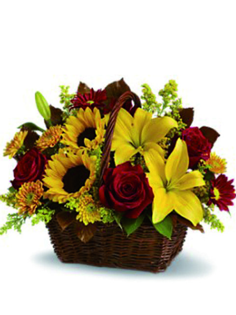 cesto di rose girasoli e gigli